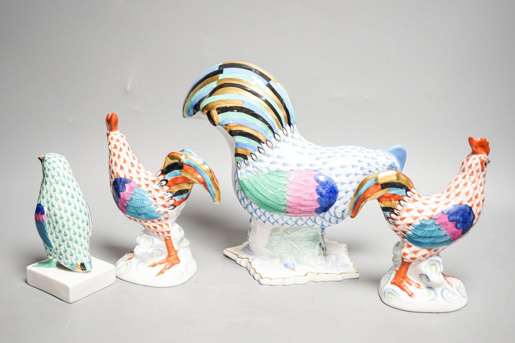 Three Herend Figures of cockerels and a penguin 18cm
